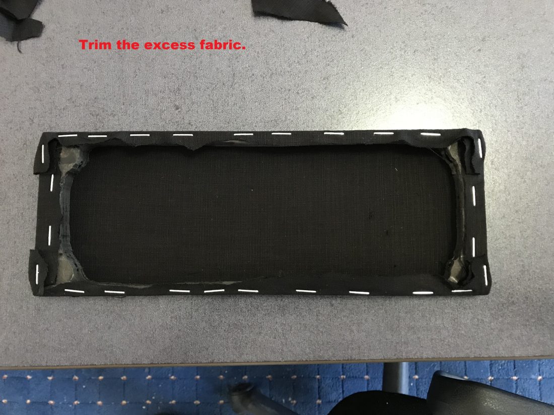 trim excess cloth from grill